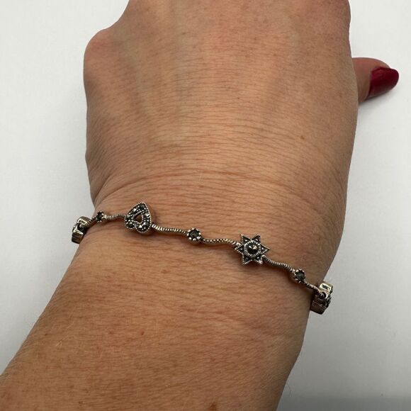Beautiful marcasite and sterling silver hearts, stars, and flowers bracelet!